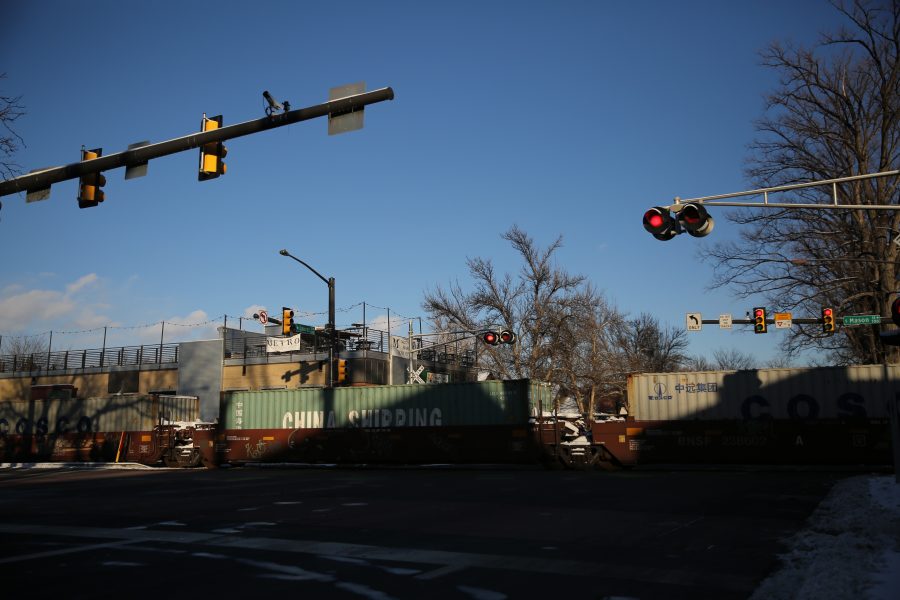 A freight train is stopped in the intersection of Mason and Laurel streets following a collision with a pedestrian at approximately 2:57 p.m. Feb. 7. One fatality was confirmed by Fort Collins Police Services. (Forrest Czarnecki | Collegian)