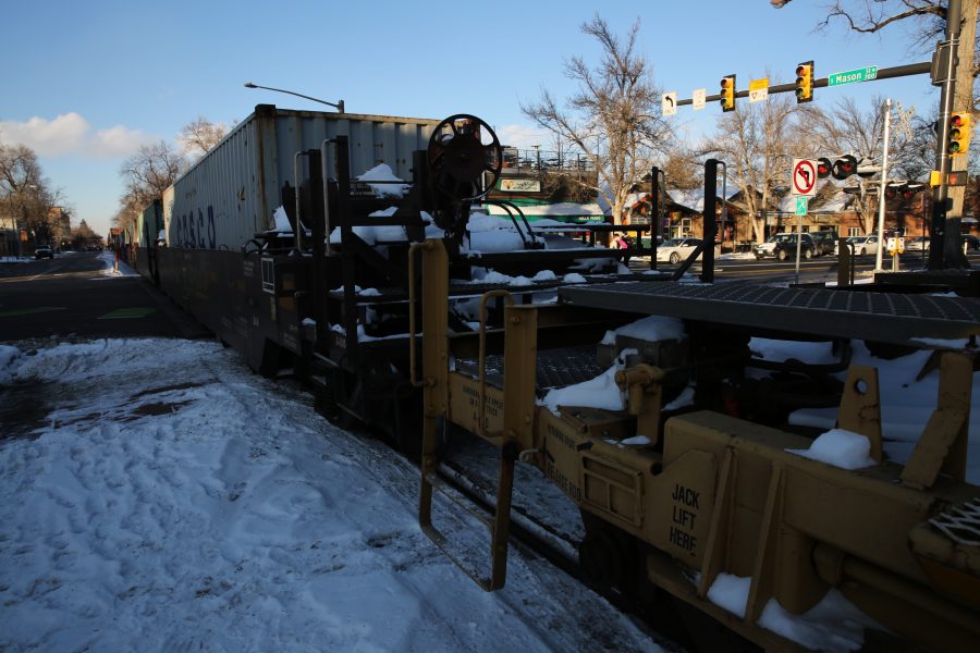 A freight train is stopped near the intersection of Mason and Laurel streets following a collision with a pedestrian at approximately 2:57 p.m. Feb. 7. One fatality was confirmed by Fort Collins Police Services. (Forrest Czarnecki | Collegian)