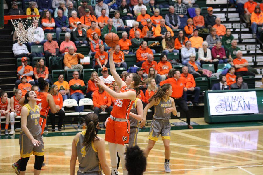 Lore Devos (35) drives in and makes a jump shot, as CSU battles Wyoming at home. The Rams lose 60-49. (Devin Cornelius | Collegian)