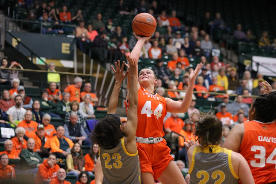 Tatum Neubert (44) jumps and shoots the ball, as CSU battles Wyoming. CSU falls short 60-49. (Devin Cornelius | Collegian)