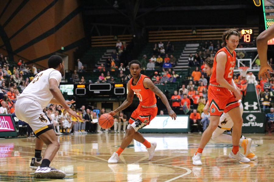 Hyron Edwards (0) looks for an opportunity to pass the ball, as the Rams battle the WYO Cowboys. CSU wins 83-48. (Devin Cornelius | Collegian)