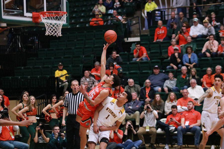 Anthony Masinton-Bonner (15) drives to the basket and shoots, during the Border War Game(. The Rams win 83-48. Devin Cornelius | Collegian)