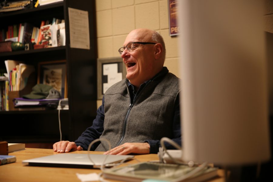 Colorado State University journalism and media communication professor Mike Humphrey talks to students during his office hours in the Clark Building. Humphrey was recently awarded one of CSU's Best Teacher Awards, one of six professors to win. (Forrest Czarnecki | Collegian)