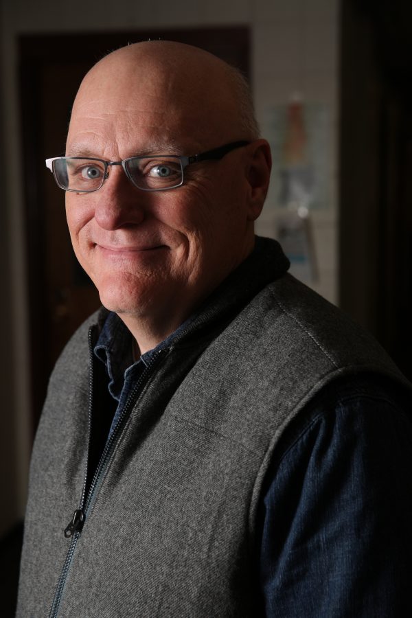 Colorado State University journalism and media communication professor Mike Humphrey poses for a portrait near his office in the Clark Building. Humphrey was recently awarded one of CSU's Best Teacher Awards, one of six professors to win. (Forrest Czarnecki | Collegian)