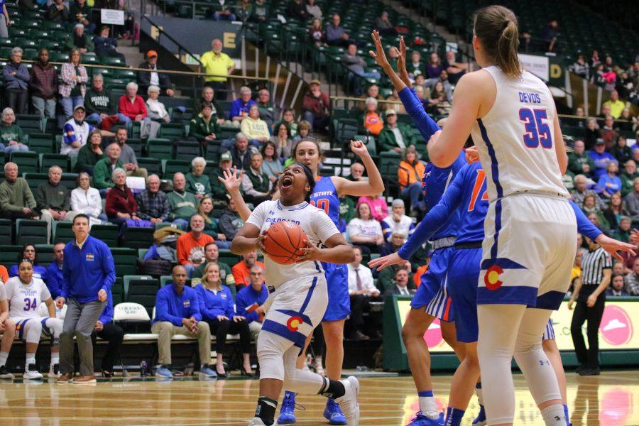 Grace Colaivalu(23) drives under the basket and attempts a layup during overtime, as Colorado State battles Boise State. CSU falls in OT 72-63. (Devin Cornelius | Collegian)