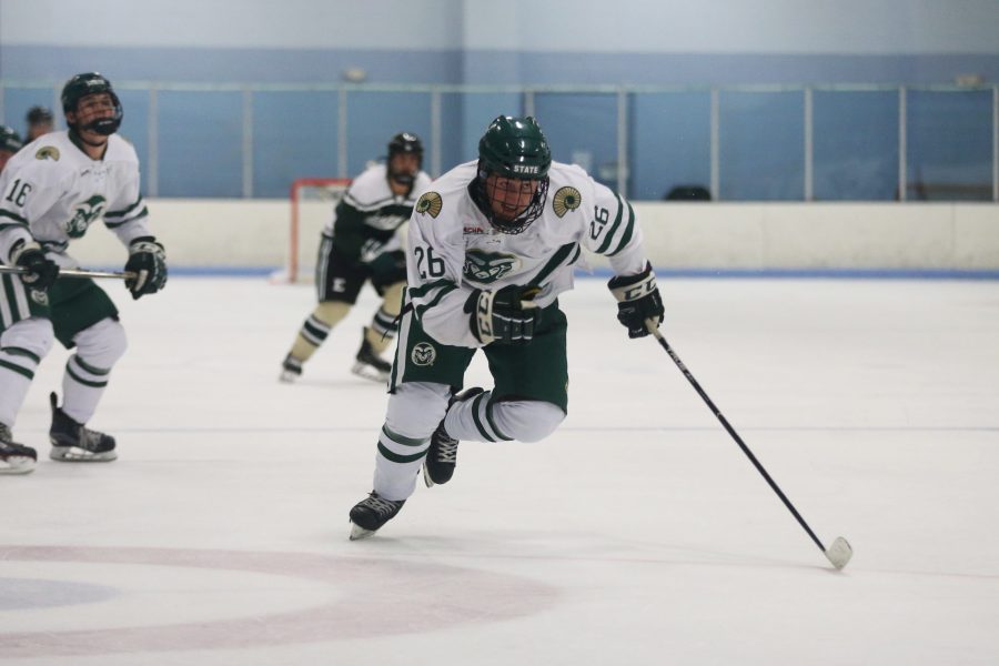 Defensemen Corey Taylor chases down a lose puck against Eastern Michigan during the second period on Sept 29 at the EPIC Center in Fort Collins. The Rams Hockey Team fell to the Eastern Michigan Eagles 4-1. (Elliott Jerge | Collegian)