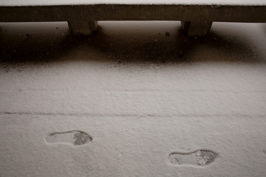 Footprints are pictured in the snow underneath the Clark B wing on Feb. 6. Several inches of snow fell on Fort Collins Wednesday morning. No more snow is in the forecast for the rest of the week, although temperatures may stay below 40 degrees Fahrenheit for the next few days, according to the National Weather Service. (Forrest Czarnecki | Collegian)