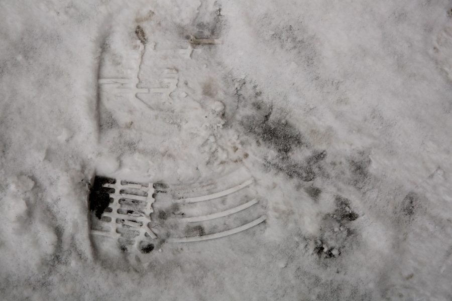 Footprints are pictured in the snow underneath the Clark B wing on Feb. 6. Several inches of snow fell on Fort Collins Wednesday morning. No more snow is in the forecast for the rest of the week, although temperatures may stay below 40 degrees Fahrenheit for the next few days, according to the National Weather Service. (Forrest Czarnecki | Collegian)