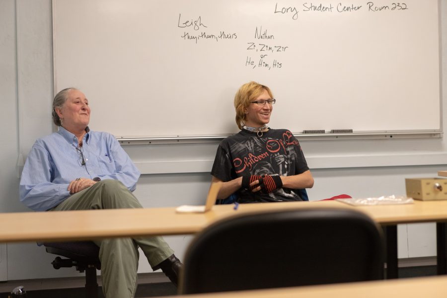 Leigh Redeker and Nathan Klein speak to a student audience during a Visible Voices panel hosted by the Pride Resource Center on campus. Redeker and Klein are both volunteers for the program that intends to increase conversation and knowledge about the LGBTQ community. Redeker says, "[We're here] so we can talk to people and they can get a more personal idea of who we are. We're here to give insights." (Brooke Buchan | Collegian).