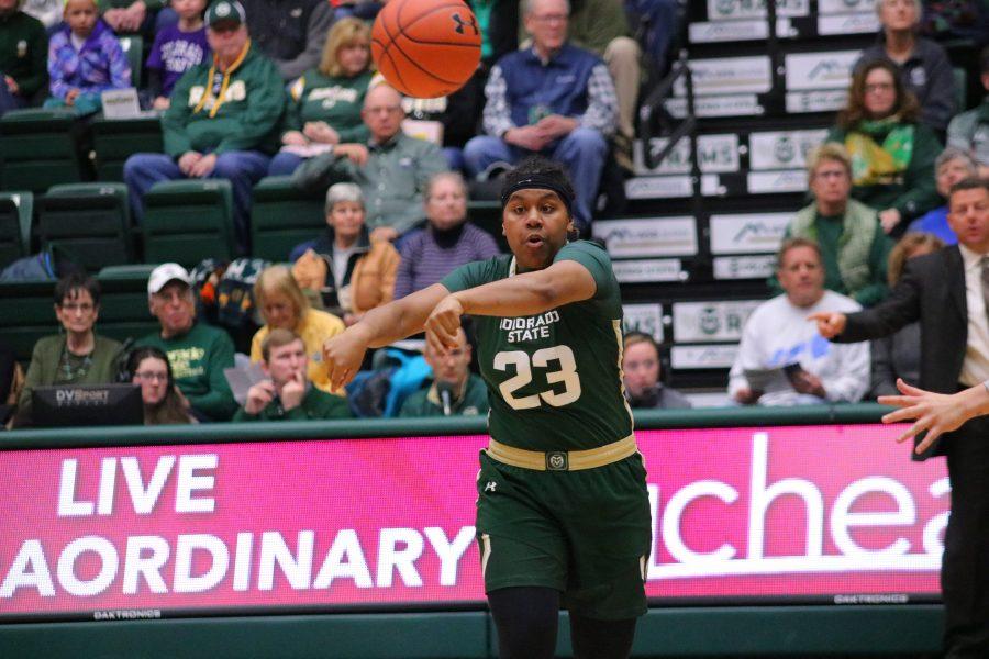 Grace Colaivalu(23) passes the ball to a teammate, as Colorado State battles New Mexico. CSU falls 79-56. 
(Devin Cornelius | Collegian)