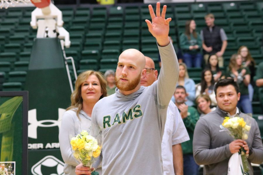Robbie Berwick (14) waves to the crowd as he receives a standing ovation before CSUs senior day game at home against UNLV. The Rams lose 65-60 (Devin Cornelius | Collegian)