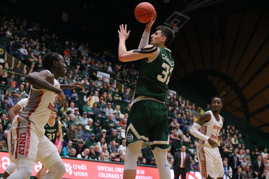 Nico Carvacho(32) pulls up and shoots while inside the paint, as CSU takes on UNLV at home on senior night. CSU falls short 65-60.(Devin Cornelius | Collegian)