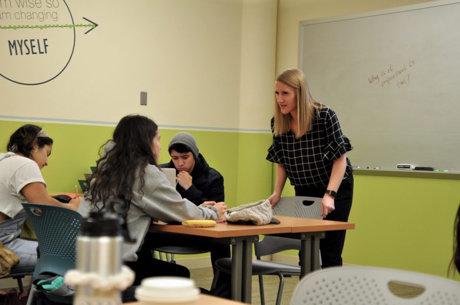 Leanna Biddle, Career Education Manager, talks with a student during her New Student Seminar Course at the Career Center Classroom in the Lory Student Center. (Anna Montesanti | Collegian)