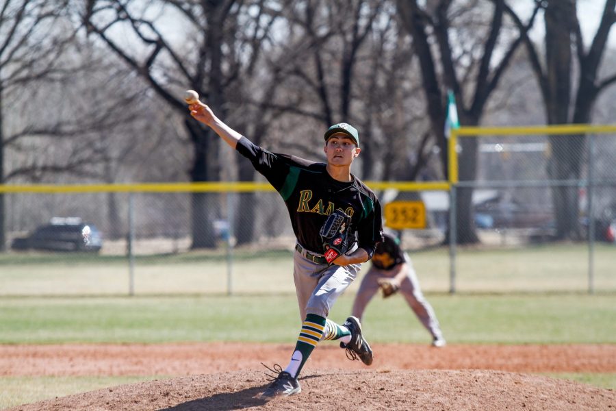 Daniel Terão releases a pitch during the Rams rescheduled game against the University of Northern Colorado March 31 at City Park Field. The Rams beat the Bears  9-4 and 17-2 in back to back games. (Ashley Potts | Collegian)