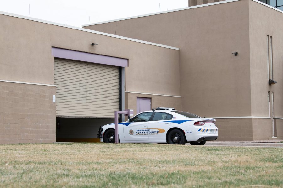 A police car enters the Larimer County Jail April 9. The Larimer County Jail has plans in place to expand its facility to accommodate for the increasing population of Larimer County. It is expecting to add an additional 400 to 500 beds that would add to the jail’s current 500 beds, ensuring inmate separation is adequate for all genders, ages and behaviors inside the jail.  “The proposed expansion of the jail is to meet the needs of today’s populations,” Captain Palmer, facility administrator for the Larimer County jail said. “The Larimer County jail has been run 24 hours a day and 365 days a year for 35 years and it is wearing out.” (Colin Shepherd | Collegian)