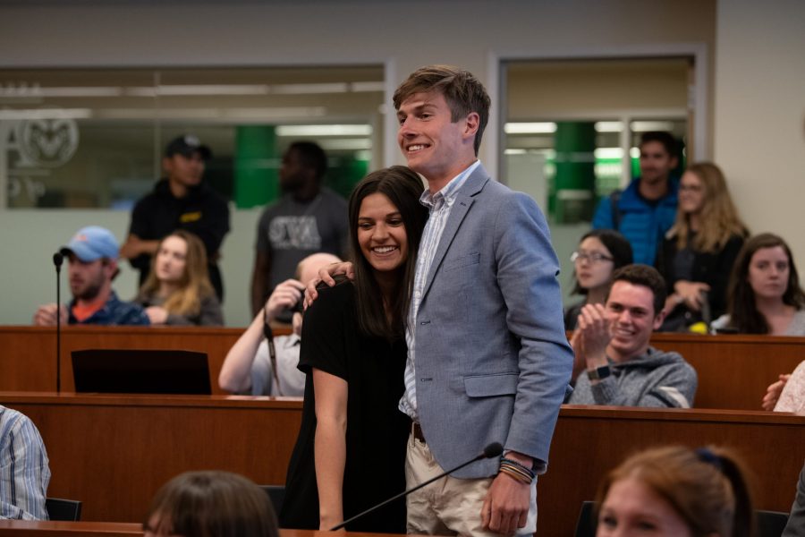 ASCSU President-Elect Ben Amundson and Vice President-Elect Alexandra Farias celebrate after being named the next president and Vice President of the Associated Students of Colorado State University April 11 in the ASCSU Senate Chambers. The election season saw a record-breaking 26.6% voter turnout of the student body. (Colin Shepherd | Collegian)