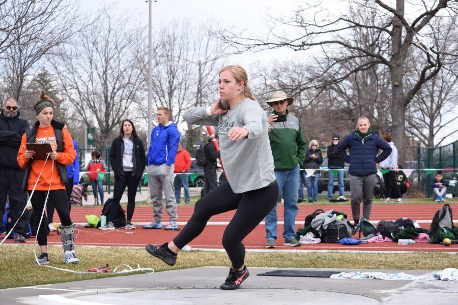 Taryn Sieg winds up for her shot put throw on April 14, 2019. Sieg placed first in this event with a throw of 14.96m. (Alyse Oxenford | Collegian)