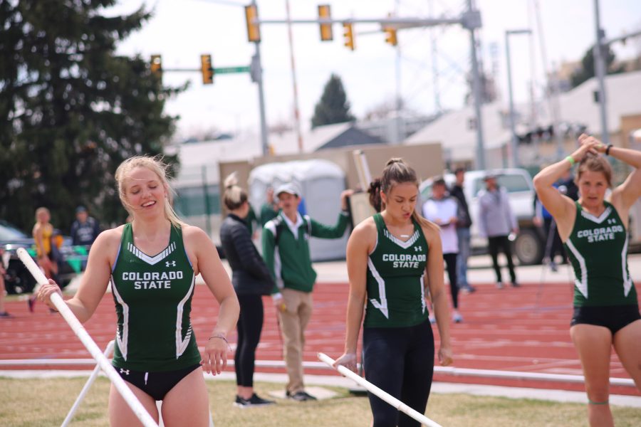 Madeline Wilson prepares to vault while her teammates look on, at the Doug Max Invitational. Wilson placed second in the event. (Devin Cornelius | Collegian)