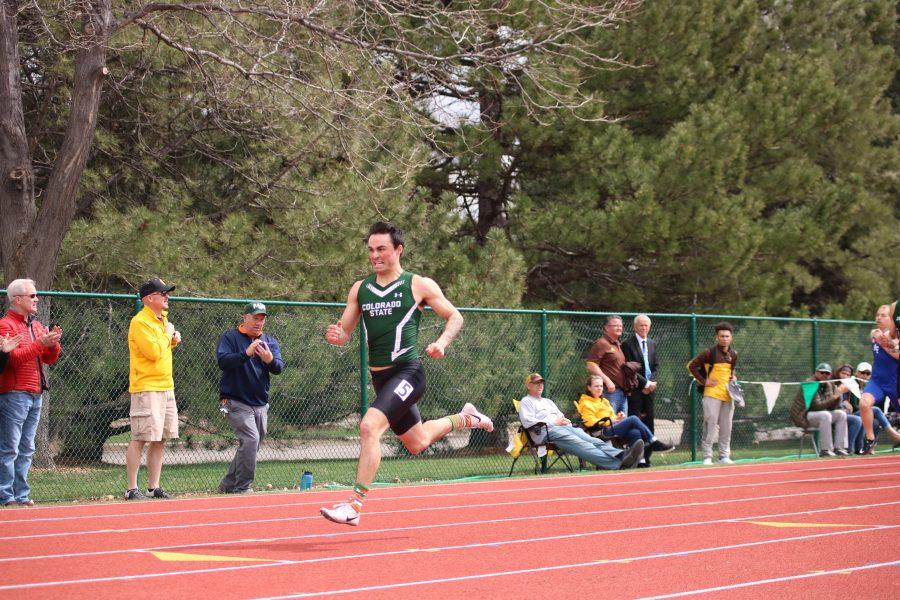 Nathan Gish sprints towards the finish-line during the men's 200 meter dash. Gish takes first place in the event. (Devin Cornelius | Collegian)
