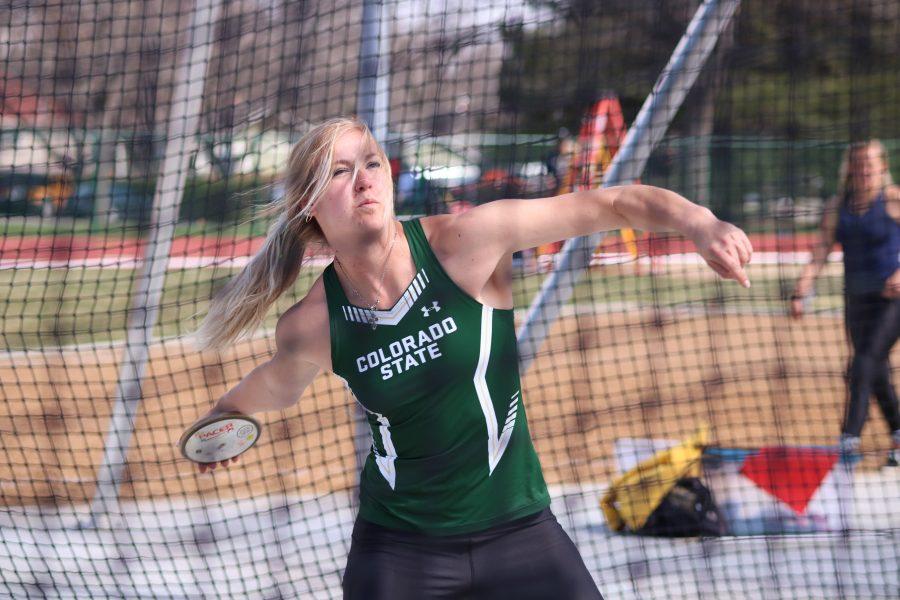 Taryn Sieg throws the disk during the discus event, at the Doug Max Invitational. Sieg placed second in the event(Devin Cornelius | Collegian)