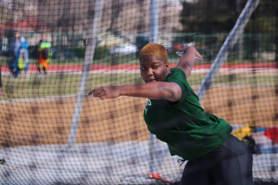 Shadae Lawrence spins as she participates in the discus throw event, at the Doug Max Invitational April 14. Lawrence places first in the event. (Devin Cornelius | Collegian)