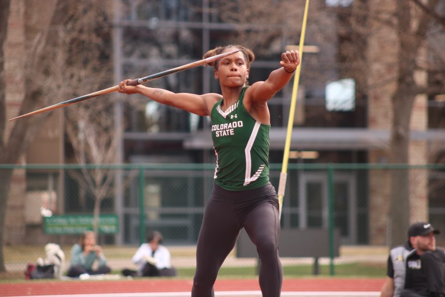 Aria Tate runs up and prepares to throw her javelin at the Doug Max Invitational. She placed fifth in the event. (Devin Cornelius | Collegian)