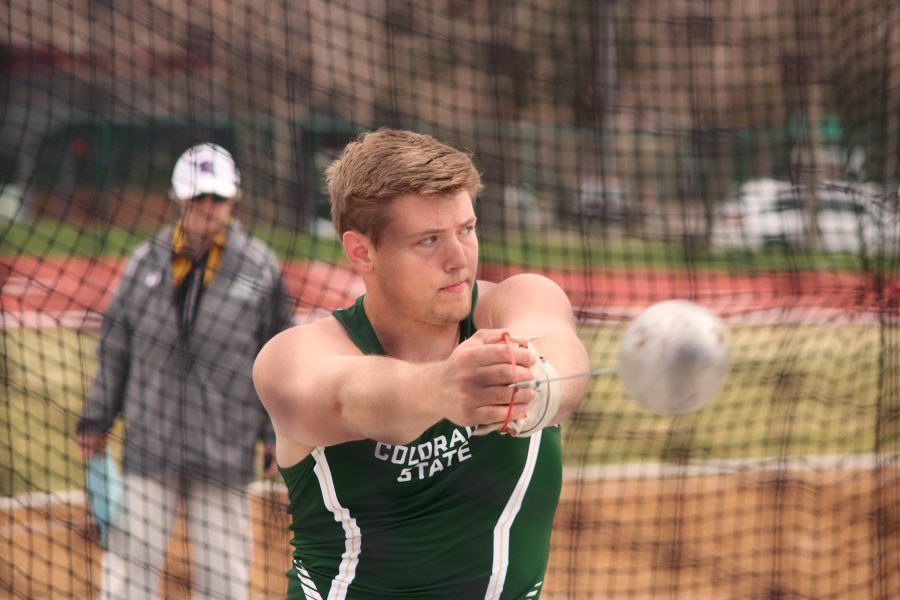 Adam Dawson looks towards the hammer throw field, as he winds up his throw at the Doug Max Invitational. Dawson placed sixth in the competition (Devin Cornelius | Collegian)