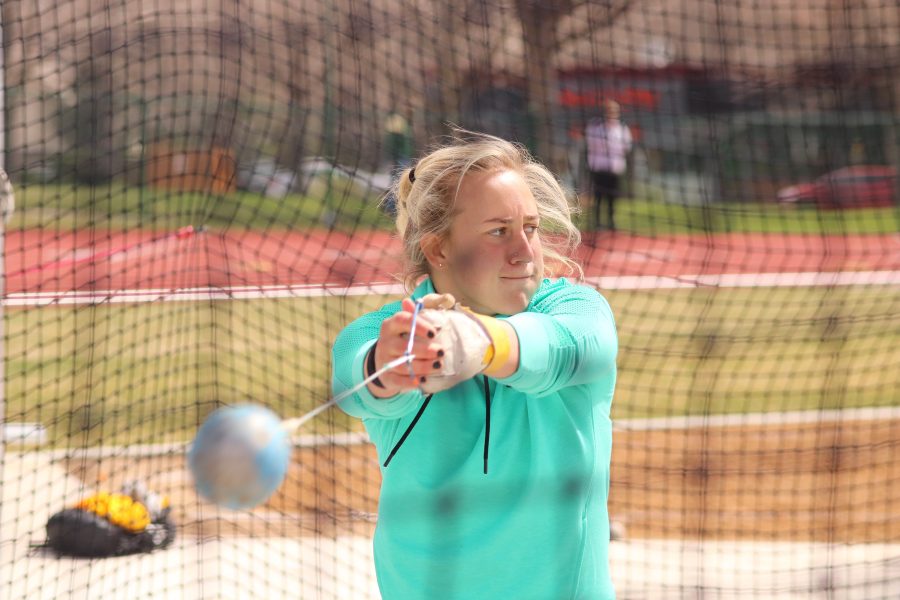 Gabi McDonald looks out to spot where she wants to throw, as she competes in the Doug Max Invitational. She placed tenth over all. (Devin Cornelius | Collegian)