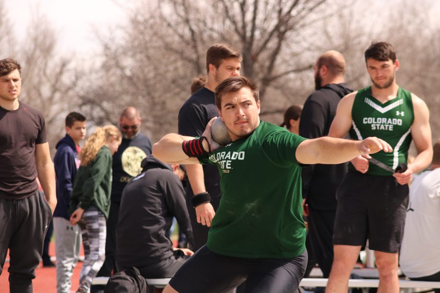 Weston Wright prepares to throw the shot put ball, during the Doug Max Invitational. Weston placed seventh in the event (Devin Cornelius | Collegian)