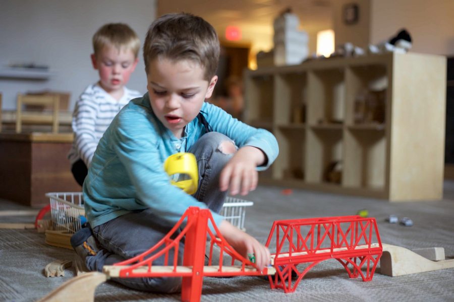 Kids play with a train set in Colorado State Universitys Early Childhood Center April 16, which is not a resource meant for student-parents. (Ryan Schmidt | Collegian)