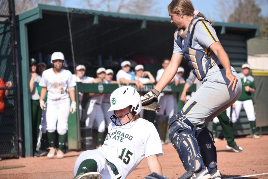 Brooke Polenz slides into home base in the April 23, 2019 game against UNC. Polenz is a freshman at CSU. (Alyse Oxenford | Collegian)