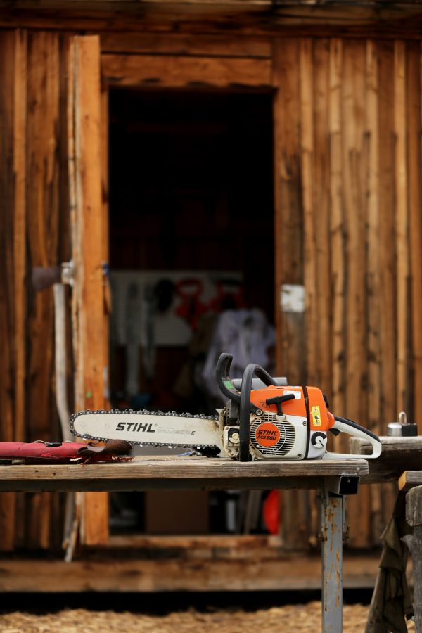A chainsaw sits on a repair bench at one of the Colorado State University logging team's recent practices. (Forrest Czarnecki | College Avenue)