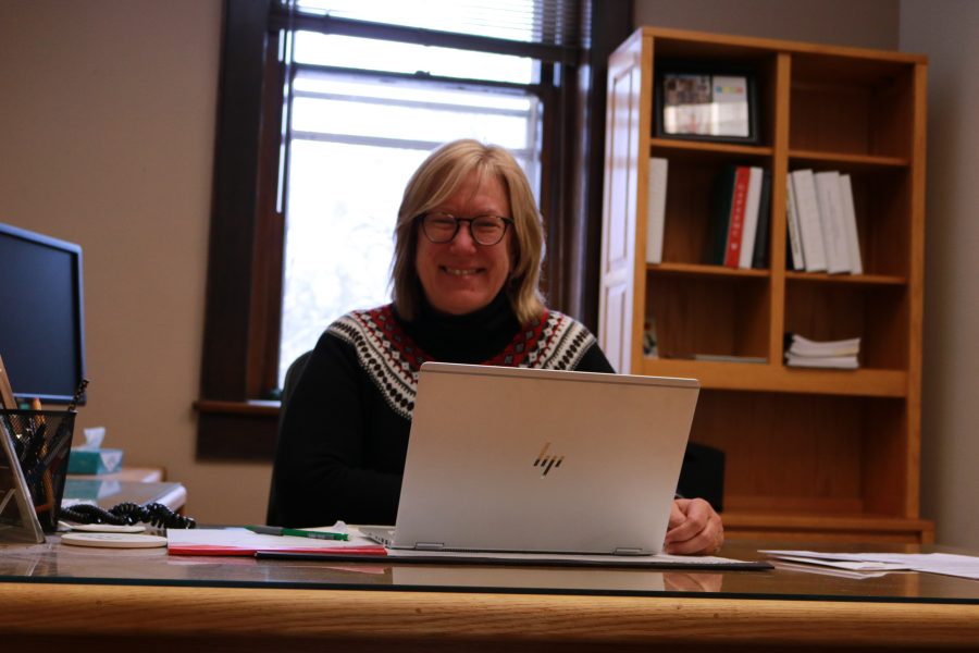 Lise Youngeblade smiles for a photo, while working on her laptop. She will be the new dean of the College of Health and Human Sciences starting August fifth. (Devin Cornelius | Collegian)
