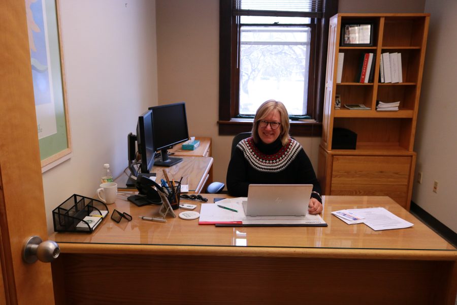 Lise Youngeblade smiles for a photo, while working on her laptop. She will be the new dean of the College of Health and Human Sciences starting August fifth. (Devin Cornelius | Collegian)