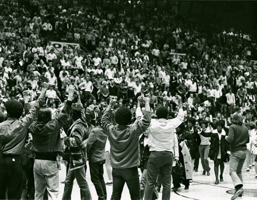 The crowd and police at the February 1970 demonstration against Brigham Young University in Moby Arena. (Photo courtesy of University Historic Photograph Collection)