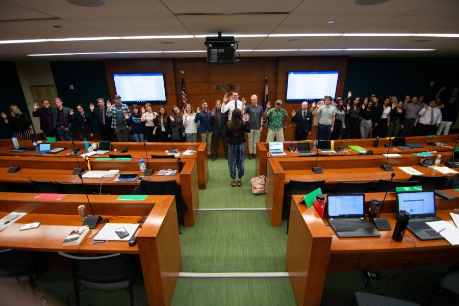 Senators of the 49th Senate of the Associated Students of Colorado State University get ratified by Chief Justice Claire Fenton on May 8. (Matt Tackett | Collegian)