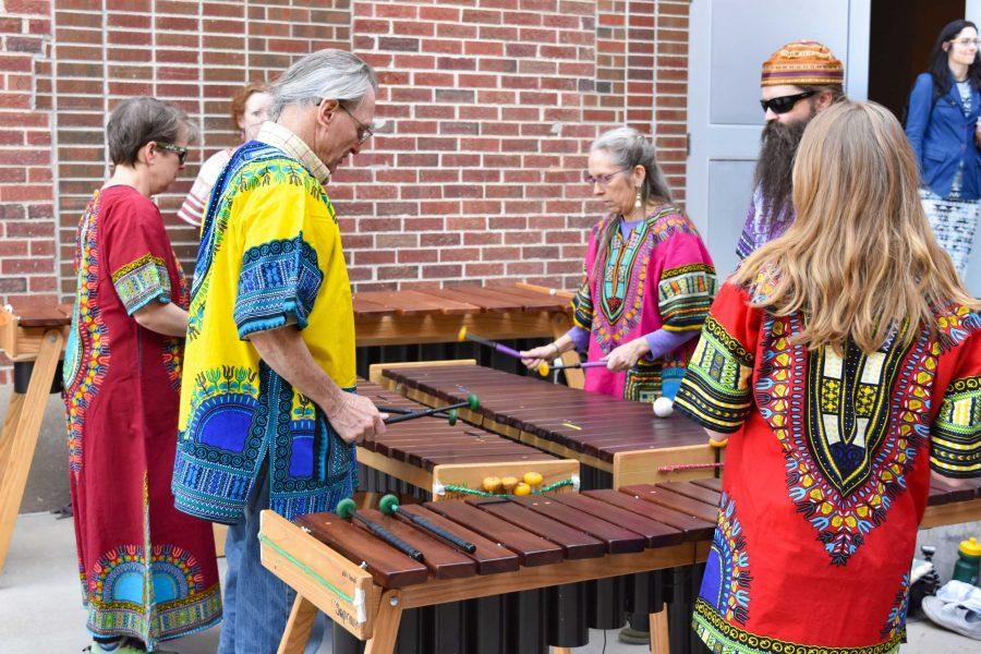 A group from Fort Collins Marimba plays music for the crowd gathered at Africa and Ale at the Gregory Allicar Museum of Art on May 3, 2019. (Alyse Oxenford | Collegian)