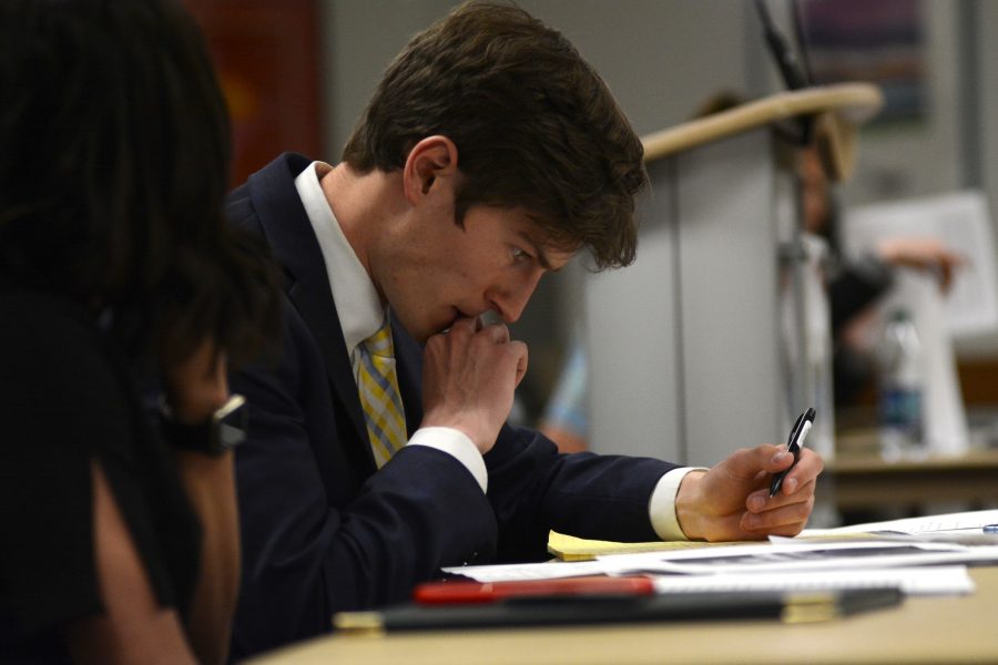 Associated Students of Colorado State University President-Elect Ben Amundson reacts to a statement made by the complainants during the ASCSU hearing May 7. (Forrest Czarnecki | Collegian)