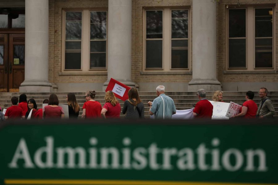 Faculty at Colorado State University protest outside of the Administration building May 13. Faculty members were protesting for higher wages and better job security. (Forrest Czarnecki | The Collegian)
