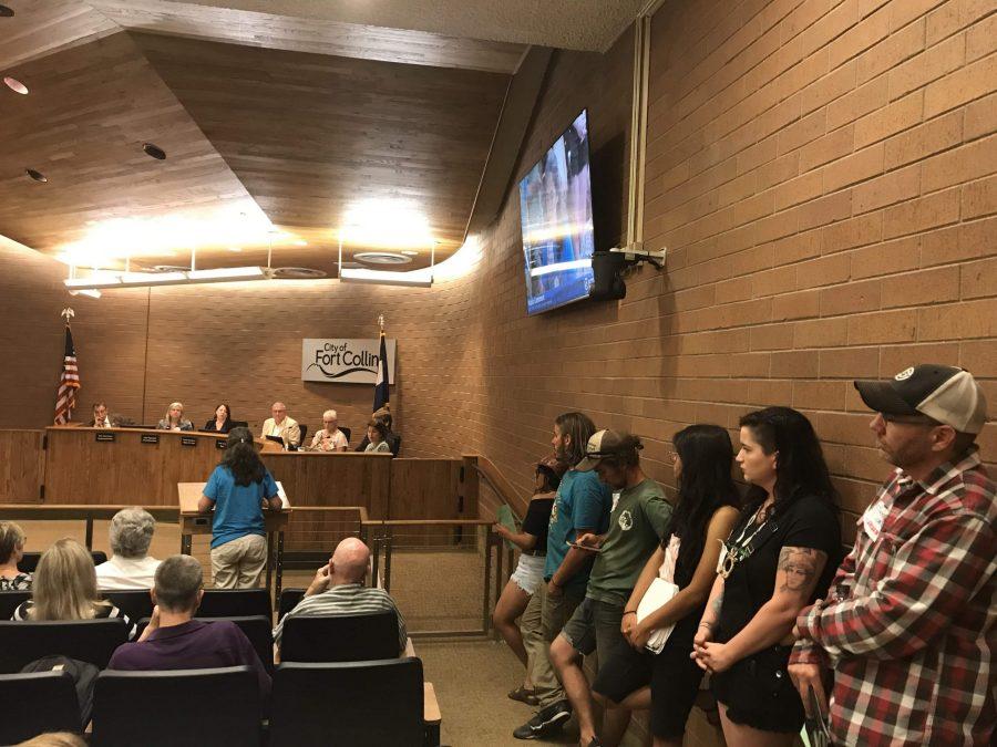 Residents wait in line to speak to Fort Collins City Council during the public comment portion. Of the 35 residents who spoke, 20 of them urged Council to adopt a Climate Emergency Resolution. (Samantha Ye | Collegian)