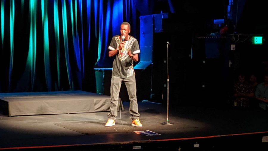 Sam Sissin does stand-up comedy during the Fort Collins JokeChella at the Aggie Theatre July 20. (Elena Waldman | Collegian) 
