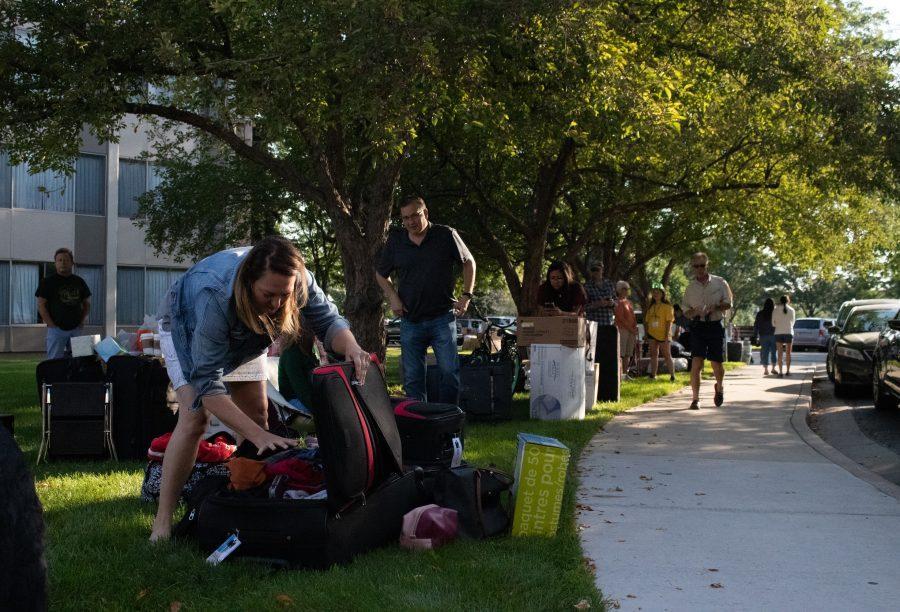 Ram Welcome 2019: Parents of first-years sort through items and wait outside Newsom Hall during move in. Ram Welcome runs the course of move-in week with activities planned for each day first-years move into their new homes.
