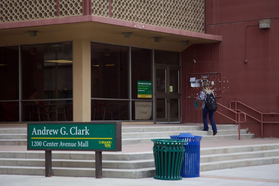 A student walks into he Clark A building August 30. Students frequently criticize the building for its low quality and need for renovations. (Ryan Schmidt | Collegian)