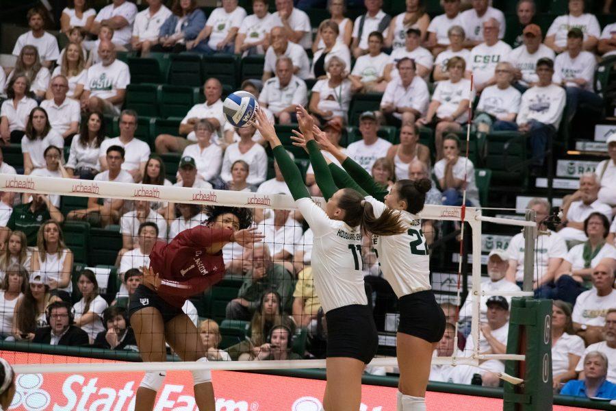 Paulina Hougaard-Jensen and Katie Oleksak jump to block the ball, as the Rams battle the Sooners during the CSU home whiteout game. The Rams walk away with the win. The score was three sets to zero. (Devin Cornelius | Collegian)