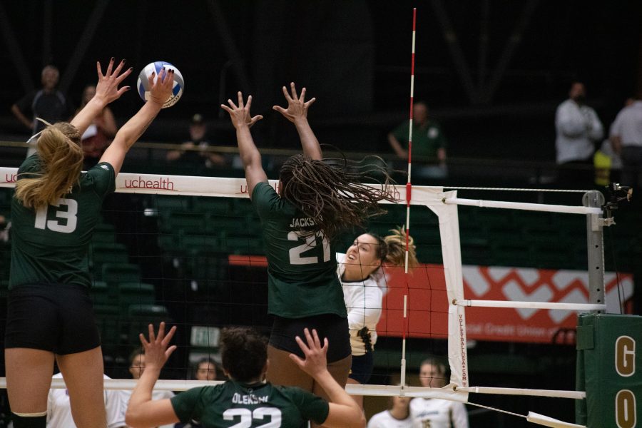 Kristie Hillyer (13) and Jessica Jackson (21)jump to block the ball, as CSU takes on the Cal Berkeley Golden Bears. The Rams fall to the Golden Bears three sets to one(Devin Cornelius | Collegian)