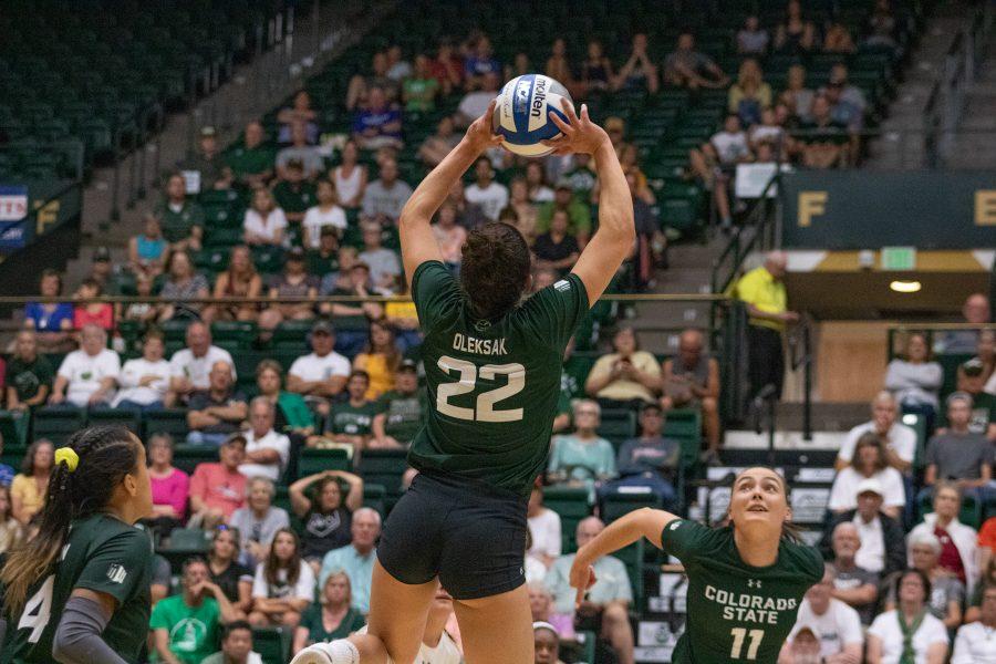 Katie Oleksak (22) sets Pauline Hougaard-Jensen (11) during CSU's home game against the University of California at Berkeley. The Rams lose the match 3 sets to 1. (Devin Cornelius | Collegian)
