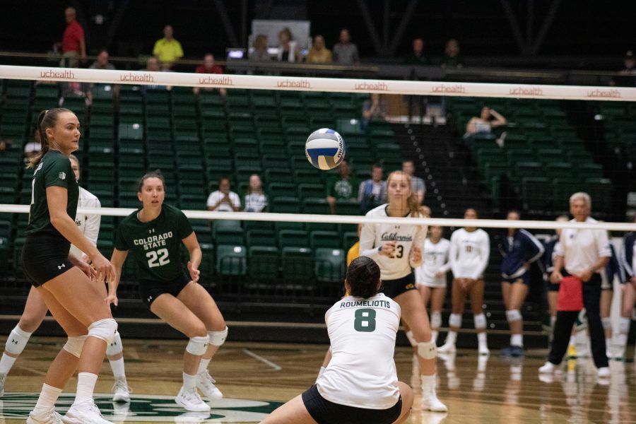 Alexa Roumeliotis (8) digs down to prevent the ball from landing on CSU's side, during CSU's game against the Golden Bears. CSU falls three sets to one. (Devin Cornelius | Collegian)