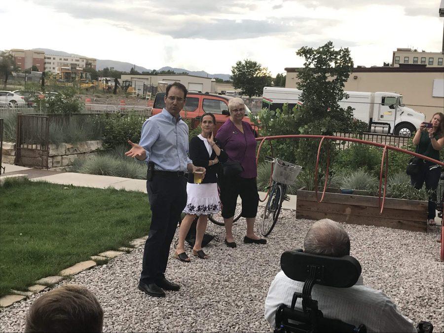 Colorado Attorney General Phil Weiser and district representatives Jeni Ardnt and Cathy Kipp answer citizen questions at a Fort Collins town hall. (Samantha Ye | Collegian)