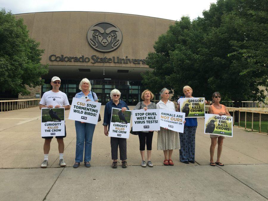 PETA protesters gather in front of Moby Arena in a demonstration against Gregory Ebels experimentation on crows and other wild caught birds. 
Photo by Laura Studley | The Collegian