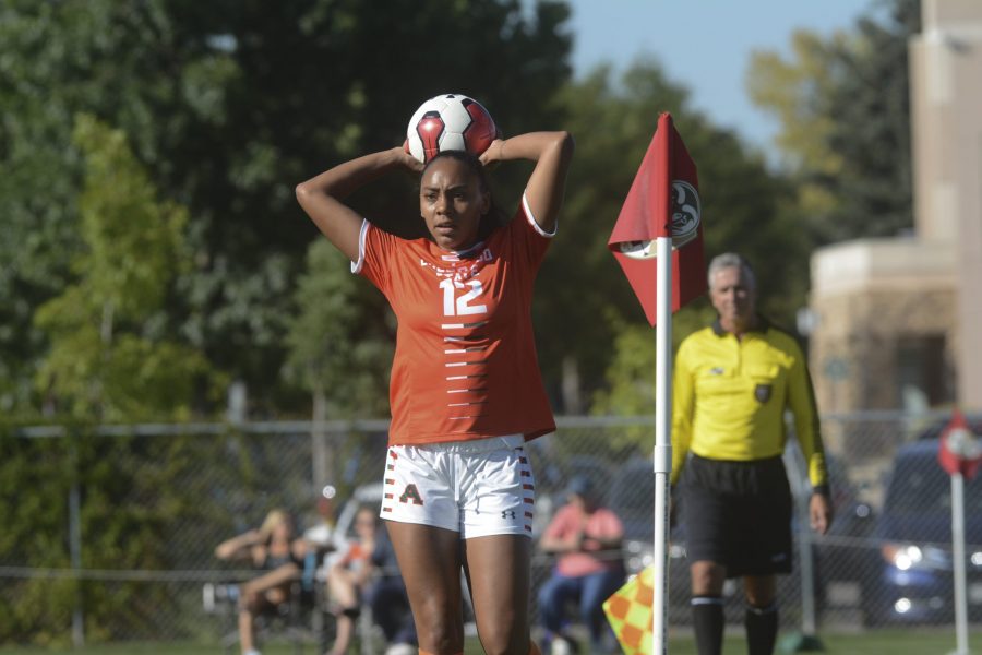 Defender Lauren Jones (12) prepares to throw the ball in against the Denver Pioneers in the Rams home 1-0 win on Sept. 13, 2019. Jones had one shot on goal in the game. The Rams hit the road next to face the Knights of Valparaiso University (Indiana)on Sept. 20, 2019. (Gregory James | Collegian) 